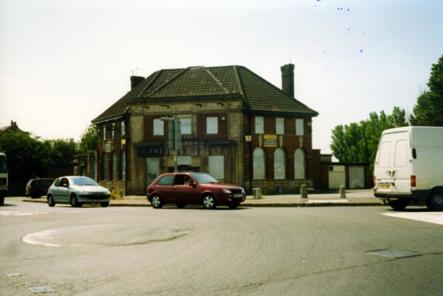 The Bridgefield public house at the junction of Cross Green Lane (left) and Pontefract Lane in August 2003. The pub is boarded up and in a state of disrepair. Despite plans to refurbish it at one point, all attempts to save it came to nothing as it was eventually demolished.
