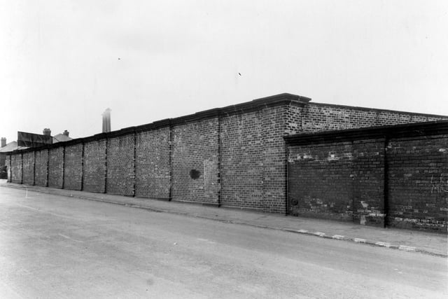 A view looking along Whitehall Road towards junction with Bangor Terrace in June 1941. Chimneys of William Rhodes Ltd, bed manufacturers can just be seen behind brick wall.