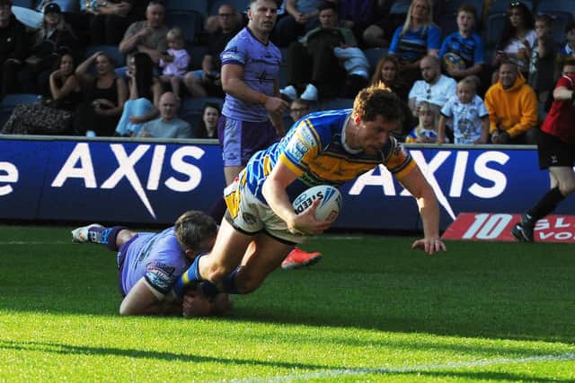 Morgan Gannon scores Leeds Rhinos' sixth and final try in the 36-12 win against Warrington Wolves. Picture by Steve Riding.
