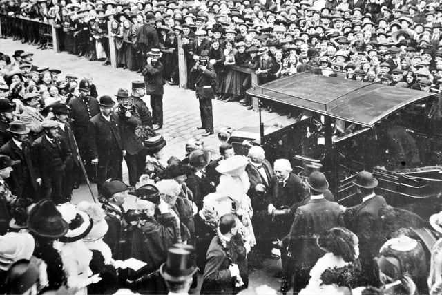 The Prime Minister of the time, Morley-born Herbert Henry Asquith, emerging from a car during the celebrations to mark the granting of the Freedom of the Borough of Morley to him. Vast crowds of people line the street to watch. Pictured in July 1913.