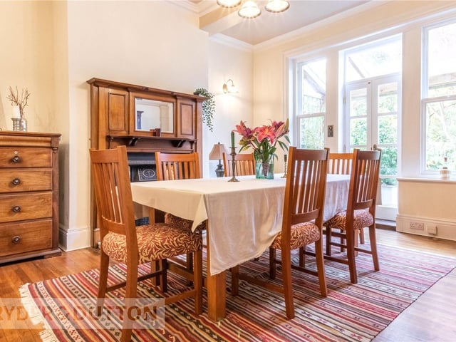 This formal dining room leads through French doors to a pergola and the rear garden - great for indoor to outdoor living in the summer.