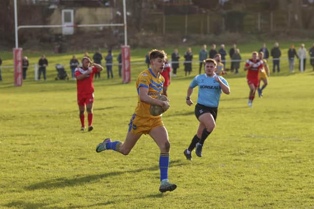 Josh McLelland runs in to score for Hunslet ARLFC in their Challenge Cup second round win at Fryston Warriors. Picture by John Victor.