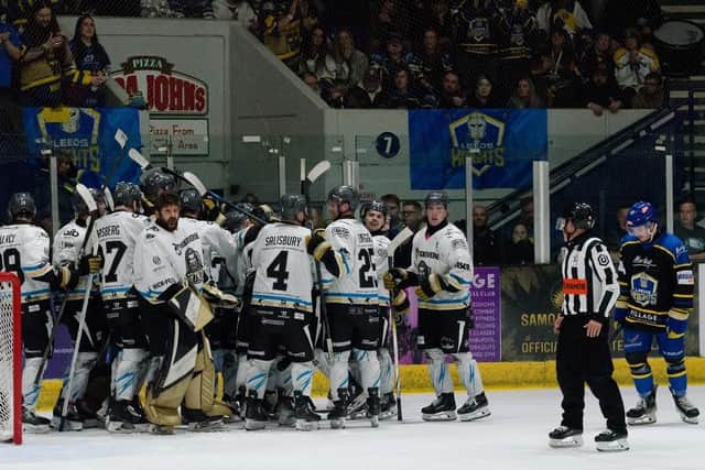END OF THE LINE: Leeds Knights' Noah McMullin (far right) shows his disappointment as Milton Keynes Lightning's players celebrate their NIHL National play-oiff semi-final win in overtime on Saturday. Picture: Chris Callaghan/Blueline Photography.
