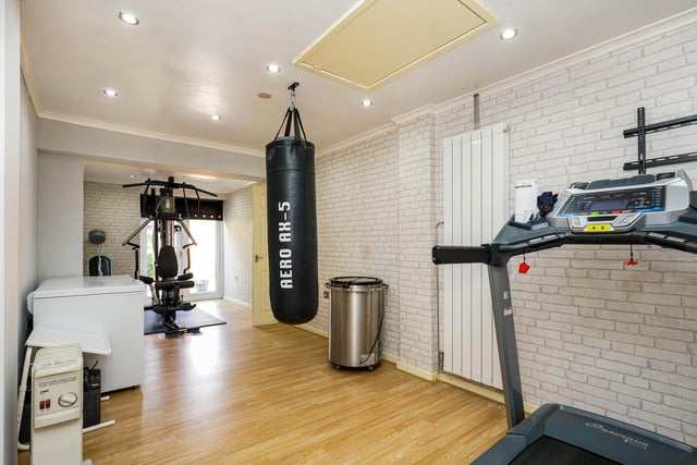 Additionally, the garage has been converted into a home gym large enough for a multigym, treadmill and more.