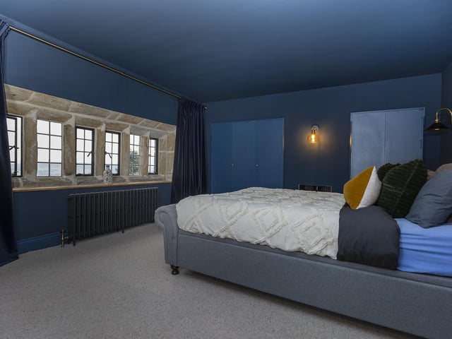 One of the property's five bedrooms, all of which have glorious views.