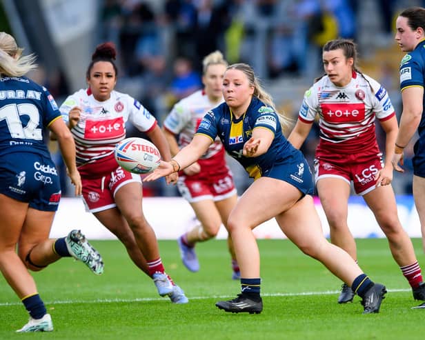 Leeds Rhinos' teenage star Ruby Bruce gets a pass away against Wigan Warriors. Picture by Allan McKenzie/SWpix.com.