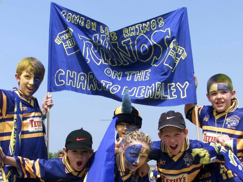 Young Rhinos fans outside the stadium before the game.