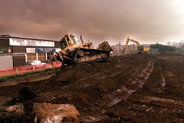 Diggers rip up the pitch  of the former Bramley Rugby League Club in March 1997.