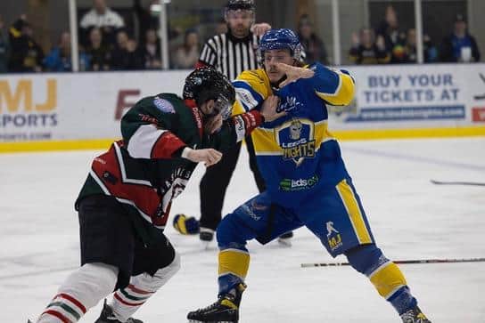 FIGHTING TALK: Leeds Knights' Oli Endicott, right, gets to grips with Basingstoke Bison's Liam Morris. Picture courtesy of John Victor