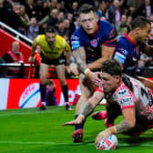 Keanan Brand scores for Leigh Leopards in their win against St Helens which sealed Leeds Rhinos' top-four finish in Betfred Super League. Picture by Olly Hassell/SWpix.com.