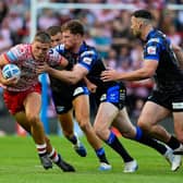 Morgan Gannon, seen tackling Leigh Leopards' Bailey Hodgson,  unexpectedly played the full 80 minutes of his Leeds Rhinos return.  Picture by Olly Hassell/SWpix.com.