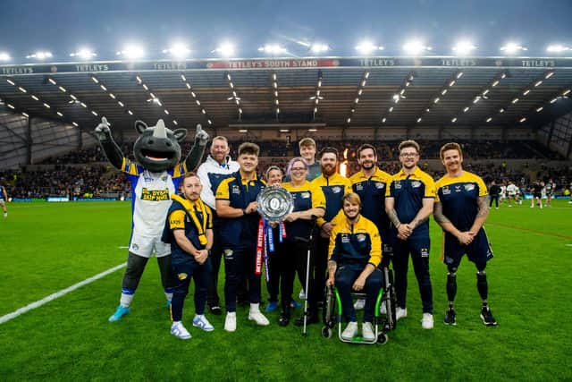 Leeds Rhinos' wheelchair team display the Betfred Wheelchair Super League leaders' shield at AMT Headingley last month. Picture by Allan McKenzie/SWpix.com.