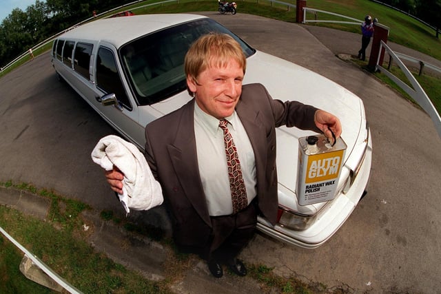This is Russ Tate pictured at Pontefract Racecourse in July 1996 with his 30 foot limo  - the longest limo in the UK.