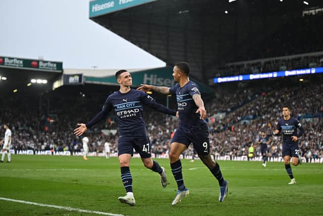 Phil Foden and Gabriel Jesus celebrate for Manchester City last season as Pep Guardiola's side ran out 4-0 winners at Elland Road (Photo by OLI SCARFF/AFP via Getty Images)