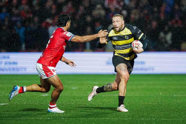 Josh Griffin evades Peta Hiku during York Knights' shock win against Hull KR in Betfred Super League round one four months ago. Picture by Alex Whitehead/SWpix.com.