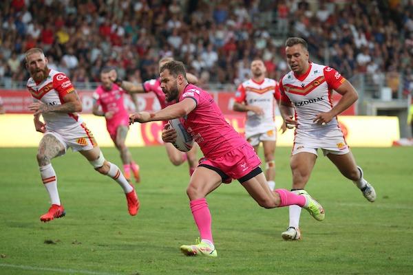 Aidan Sezer scored a golden-point try to seal an incredible 36-32 win at Catalans on July 30. Leeds trailed 30-6 when Matt Prior was sent-off with 26 minutes remaining, but - inspired by hat-trick hero Richie Myler - staged their greatest-ever comeback.



Picture by Manuel Blondeau/SWpix.com - 30/07/2022 - Rugby League - Betfred Super League Round 21 - Catalans Dragons v Leeds Rhinos - Stade Gilbert Brutus, Perpignan, France - Aidan Sezer of Leeds Rhinos runs to score the winning try