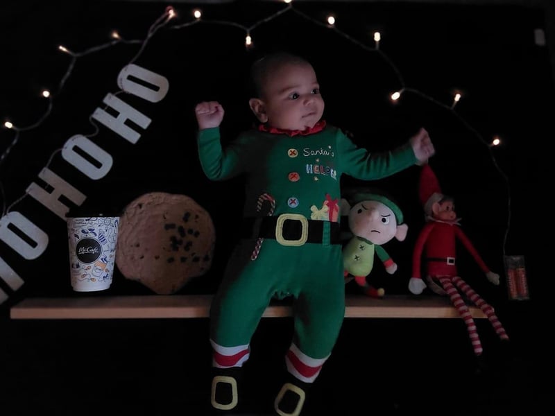 Eight week old Isaiah  is dressed as Elf on the Shelf. Submitted by Lisa-Marie Allen.
