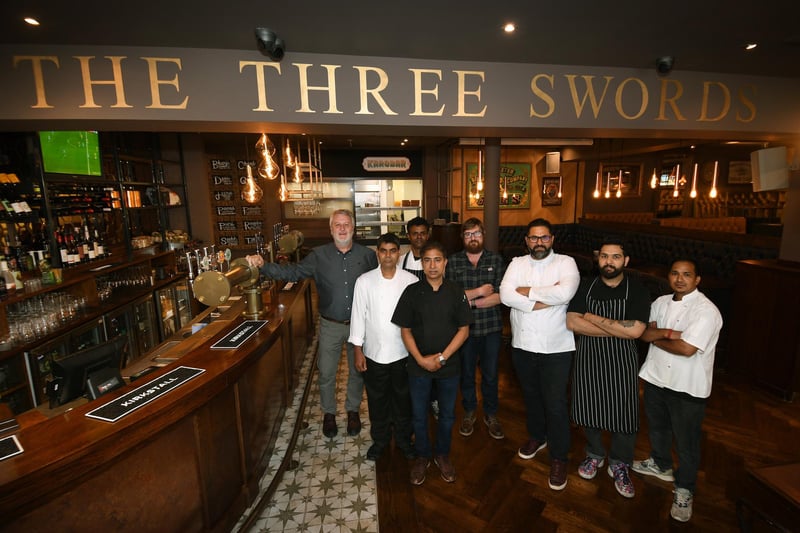 Kirkstall Brewery co-founders Steve Holt and John Kelly with the chefs at Dastaan. John said they will bring "world-class" Indian food to the new pub concept.