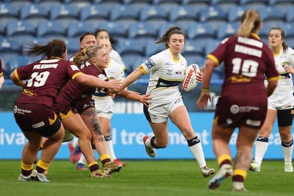 Eloise Hayward on the attack for Rhinos in last month's 80-0 win at Huddersfield. Picture by John Clifton/SWpix.com.