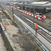 Teams from Network Rail were urgently trying to clear the waterlogged lines in Kirkstall on December 2 after a night of heavy rain.