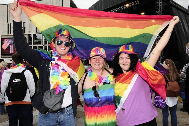 Leeds Pride 2023. Pictured from the left, Nick Richardson, Kelly Ramsden and Tanya Cowlan, from Leeds, in Millennium Square.