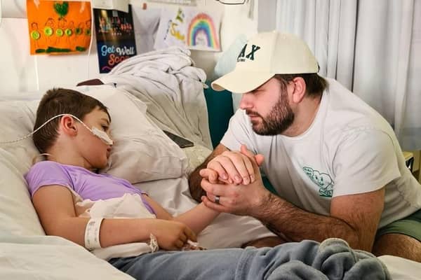 Louie spent more than 75 days in hospital after suffering a stroke whist playing football.