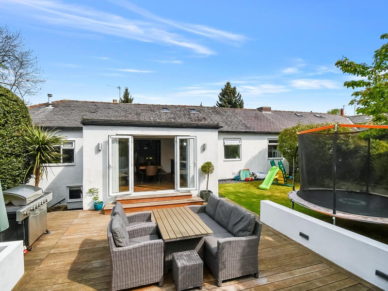 The landscaped back garden is perfect for enjoying al fresco dining in the summer.