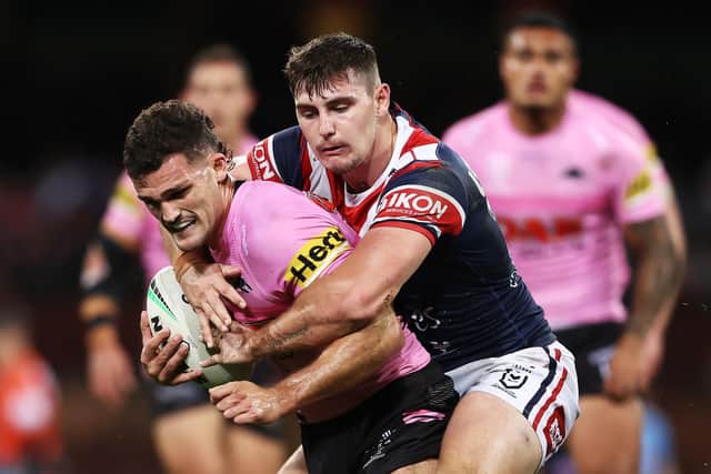New Rhinos signing Paul Momirovski, right, pictured tackling Nathan Cleary during an NRL fixture between Roosters and Penrith in 2022. Picture by Matt King/Getty Images.