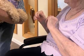 Resident at HC-One’s Augustus Court Care Home with dog, Honey