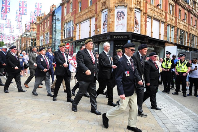 Veterans took part in the parade through the city centre.