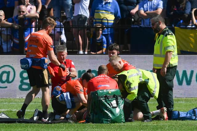 Medics treat Leeds Rhinos' Danny Levi on the field at Castleford Tigers. He was later taken to hospital for scans on a neck injury. Picture by Matthew Merrick/SWpix.com.