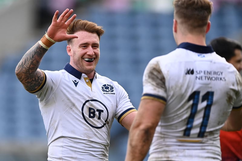 Stuart Hogg congratulates team-mate Duhan van der Merwe of Scotland after scoring their side's eighth try during the Guinness Six Nations match between Scotland and Italy at Murrayfield on March 20, 2021 in Edinburgh (Photo by Stu Forster/Getty Images)