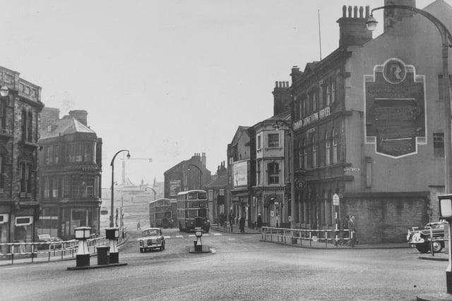 Halifax town centre looking down Broad Street in 1961 where a number of changes were suggested including the demolition of the Grand Junction Hotel, seen on the right.