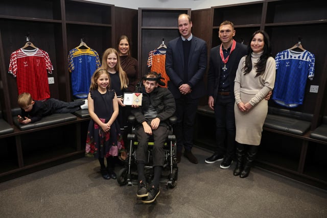 William met Burrow and Sinfield at the stadium, and presented them with their CBEs in front of their wives and the former’s three children.