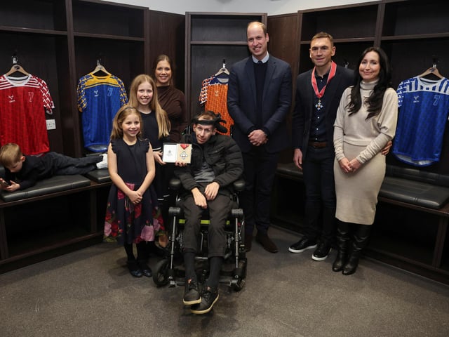 William met Burrow and Sinfield at the stadium, and presented them with their CBEs in front of their wives and the former’s three children.