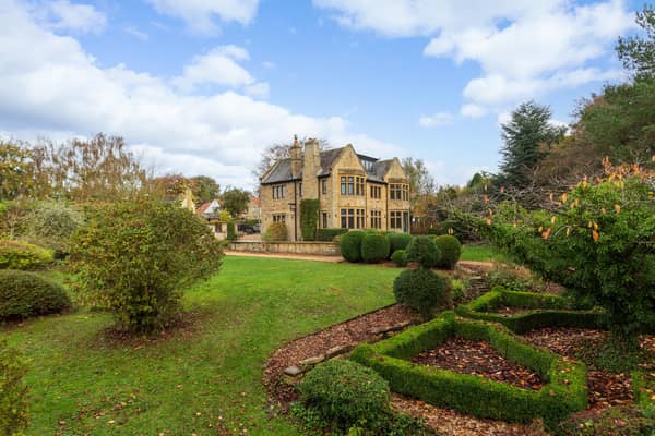 Dating back to the 1920s, the property has stunning mullioned windows and striking period features, including wooden panelling and high ceilings.