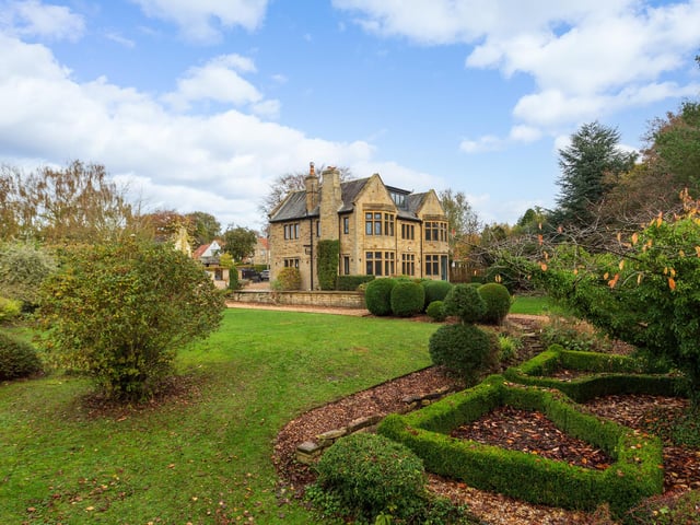 Dating back to the 1920s, the property has stunning mullioned windows and striking period features, including wooden panelling and high ceilings.