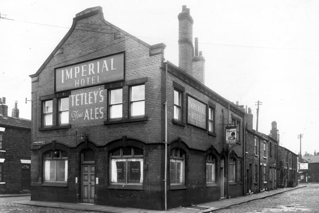 Imperial Hotel on Cross Princess Street in April 1959. This public house was also listed as number 15 New Princess Street. Back-to-back houses on the even numbered side of Dawson Street follow to the right edge. Included in slum clearance plans for Holbeck.