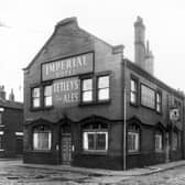 Imperial Hotel on Cross Princess Street in April 1959. This public house was also listed as number 15 New Princess Street. Back-to-back houses on the even numbered side of Dawson Street follow to the right edge. Included in slum clearance plans for Holbeck.