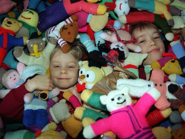 Children at Archbishop Cranmer Primary School helped make hundreds of teaddy bears for charity in January 1997. Pictured are pupils Amberzine Bolton and Michael Spink.