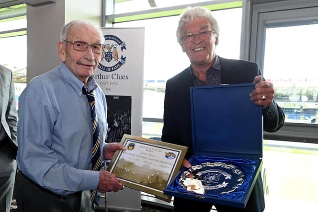 Gordon Brown, left, was inducted into Leeds Rhinos' Hall of Fame in 2024. He is pictured with players association president Alan Smith. Picture by Matthew Merrick/Leeds Rhinos.