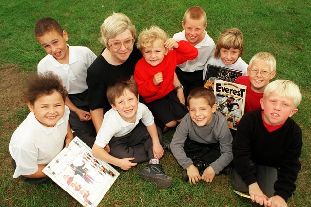 Headteacher Ann Tomkins pictured with pupils at Clapgate Primary School in September 1999 who did not miss a days attendance during all the last school year  and were rewarded with tokens for books.