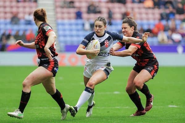 Rhinos' Fran Goldthorp on her way to scoring for England against Canada. Picture by Alex Whitehead/SWpix.com.