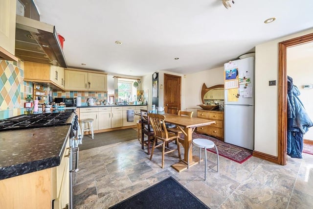 Enter on the ground floor and there is a large and open kitchen/diner with practical utility room.