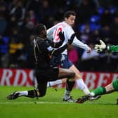MAKING HIS WAY: A 19-year-old Rodrigo scores for Bolton Wanderers in the Premier League clash at home to Wigan Athletic of January 2011.
Photo by Clive Mason/Getty Images.