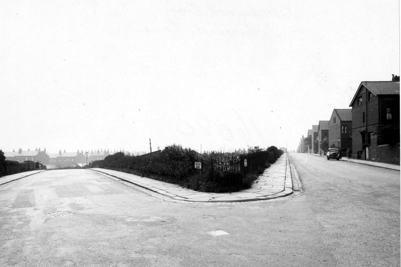 Looking south at the junction of St. Michael's Lane and Beechwood Crescent in August 1948. Allotments can be seen between the two roads with houses in the background.
