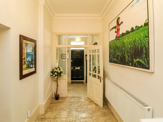 A welcoming vestibule and hallway.