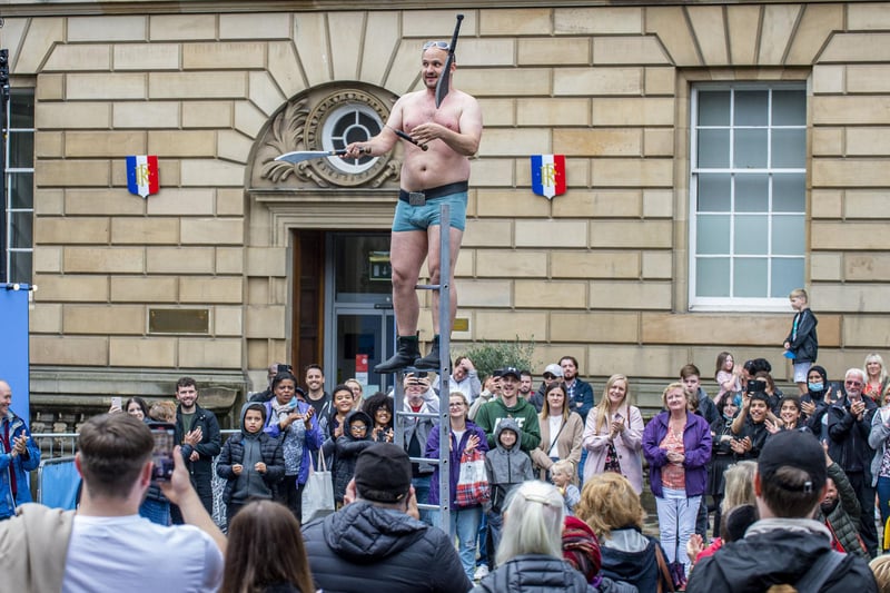 Check out some lively street performances in Parliament Square on the historic Royal Mile. During the Fringe, there is free entertainment from hundreds of performers.