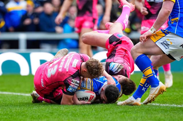 Jake Connor scores his first Super League try for Leeds Rhinos during the win against Castelford Tigers. Picture by Olly Hassell/SWpix.com.