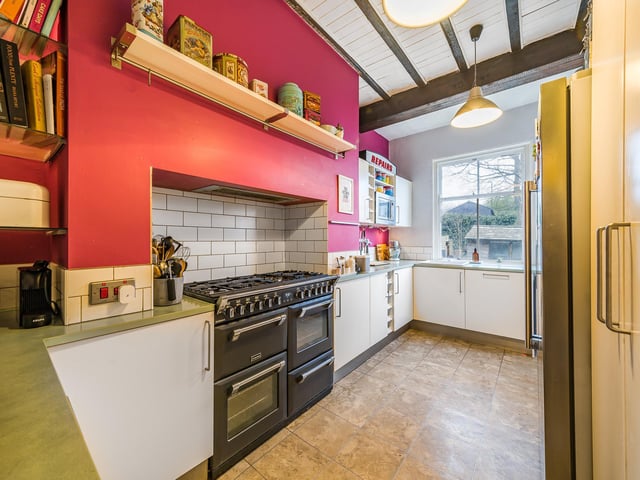 The kitchen is a rear facing room which has been modernised and well maintained. There is a rear external door and the range oven is built into the chimney.